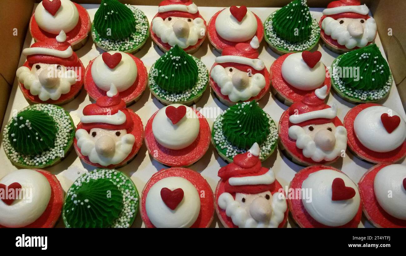 Christmas cupcakes with Santa and Christmas tree Stock Photo