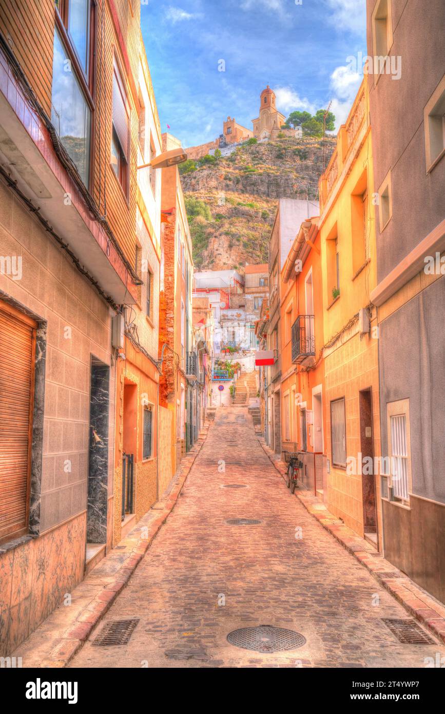 Cullera Spain old town narrow street castle view Valencian Community  colourful scene Stock Photo