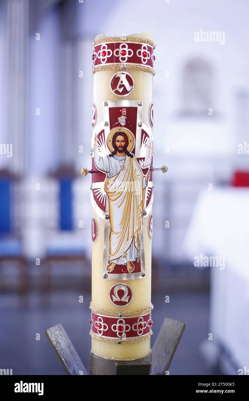 Paschal Candle Religious Symbol With Image Of Jesus Christ Stock paschal-candle-religious-symbol-with-image-of-jesus-christ-stock