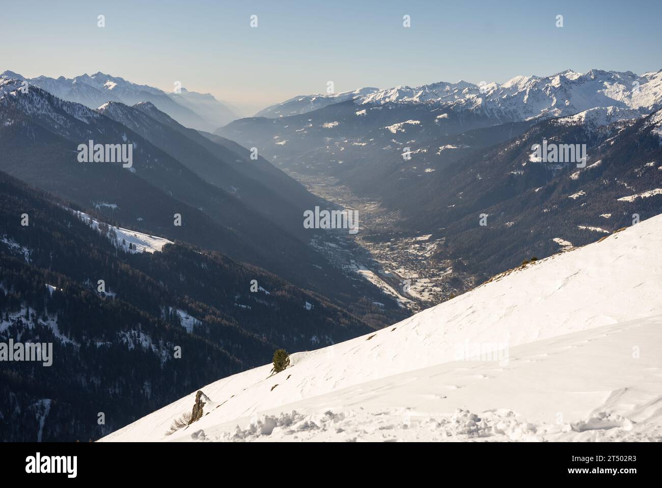 Winter view on dolomites alps in Italy.  Pinzolo in winter sunny day. Val Rendena dolomites  Italian alps, Trentino Italy. Stock Photo