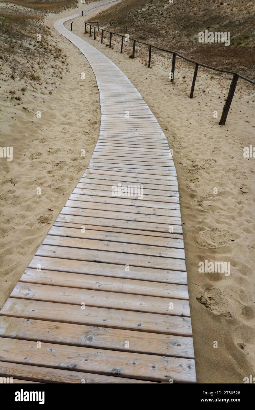 Wooden path to the sea over dunes in Lithuania Stock Photo