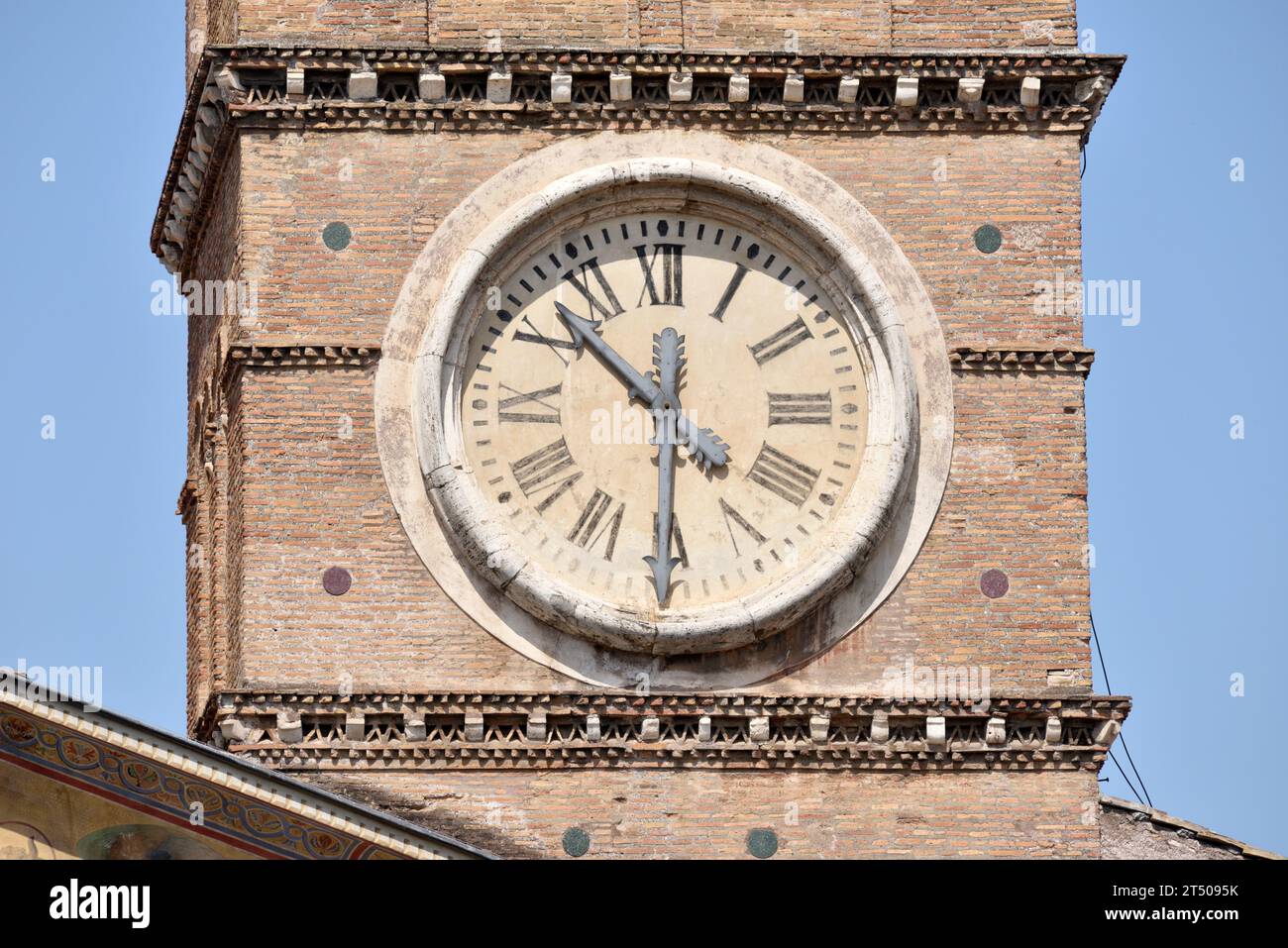 Clock, belltower of Santa Maria in Trastevere, Rome, Italy Stock Photo