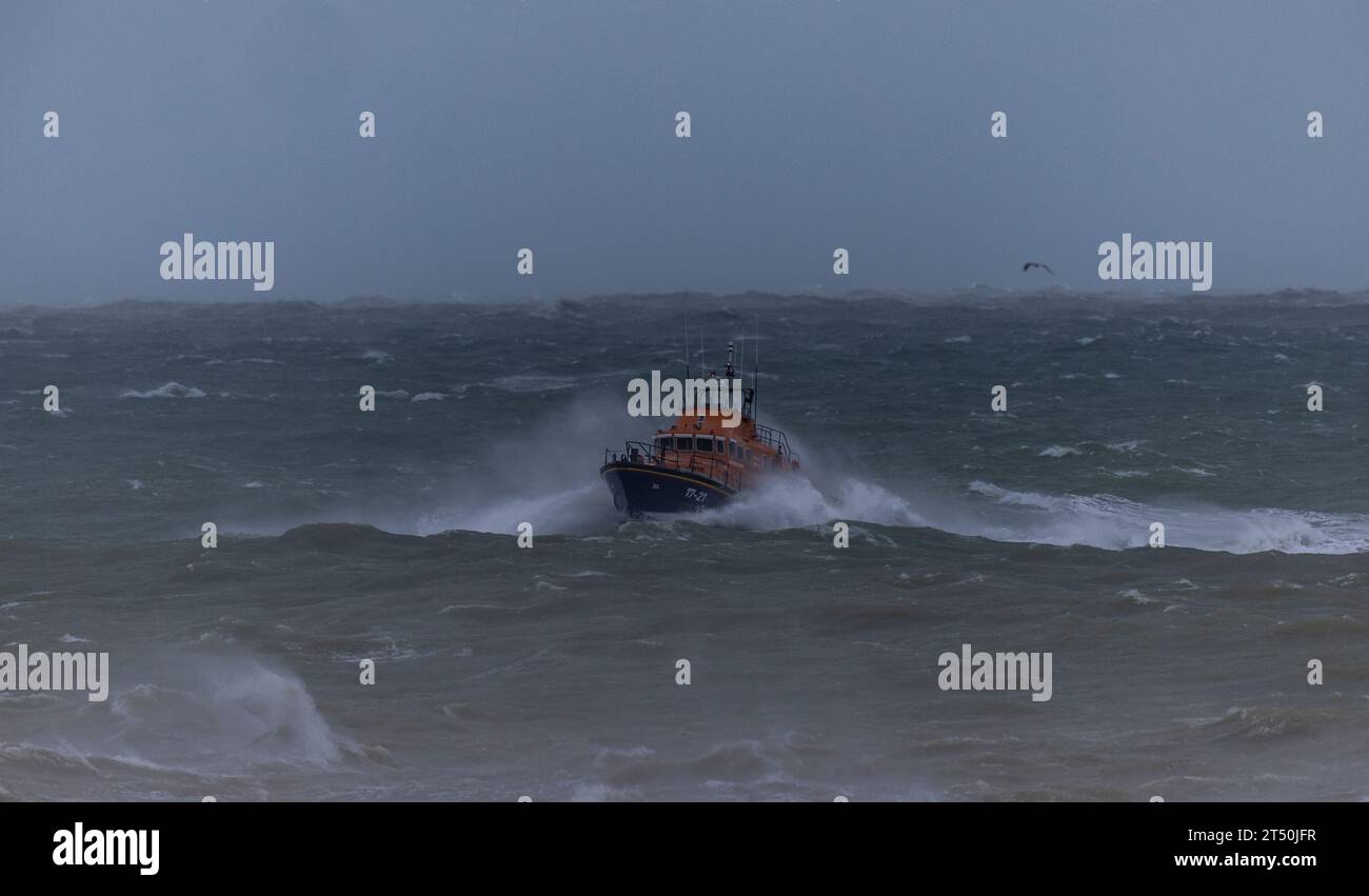 Storm Ciaran 2023, 2nd November 2023. Newhaven lifeboat navigates through the waves while returning to harbour on East Sussex UK, as Storm Ciaran hit Southern England. Steven Paston/Alamy Live News Stock Photo