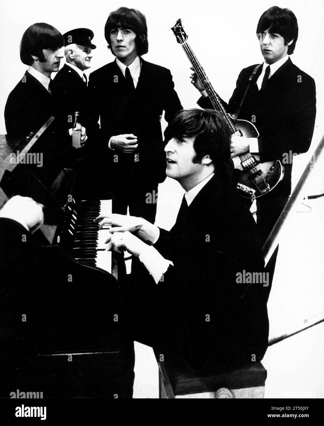 November 1, 1965, Manchester, England, United Kingdom: From L-R. are RINGO STARR, GEORGE HARRISON, PAUL MCCARTNEY and JOHN LENNON (piano) during filming of 'The Music of Lennon and McCartney' TV Special. Due to be screened on December 16th is entirely based on music and lyrics by PAUL MACCARTNEY and JOHN LENNON who also introduce each artist. The show has been recorded at Granada's Manchester TV studios and the pictures where taken during the recording. (Credit Image: © Keystone Press Agency/ZUMA Press Wire) EDITORIAL USAGE ONLY! Not for Commercial USAGE! Stock Photo