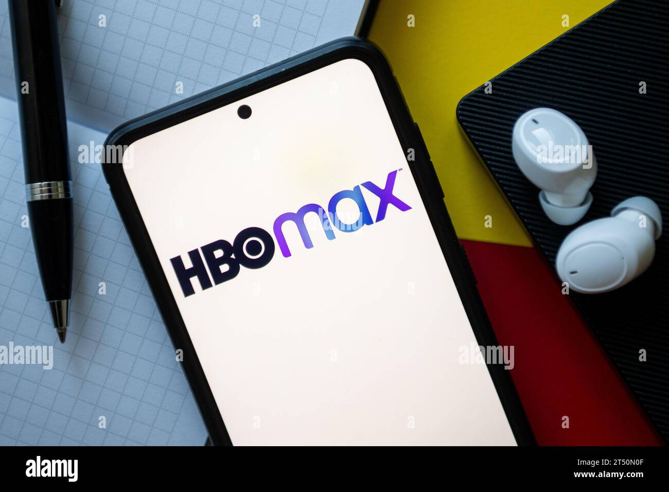 In this photo illustration a HBO Max logo seen displayed on a ...