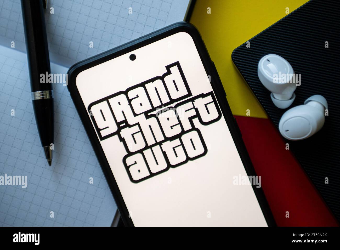 In this photo illustration a Grand Theft Auto logo seen displayed on a smartphone. Stock Photo