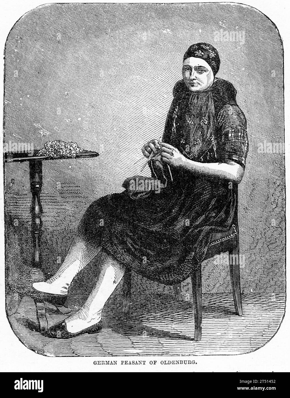 Engraved portrait of a female German peasant from Oldenburg knitting in a chair. Published circa 1887 Stock Photo