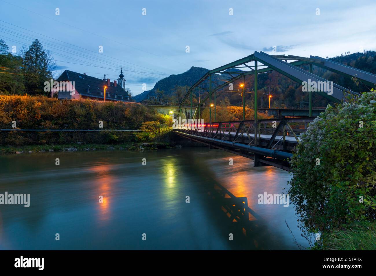 Landl: river Enns, road bridge, church in hamlet Hieflau in Gesäuse, Steiermark, Styria, Austria Stock Photo