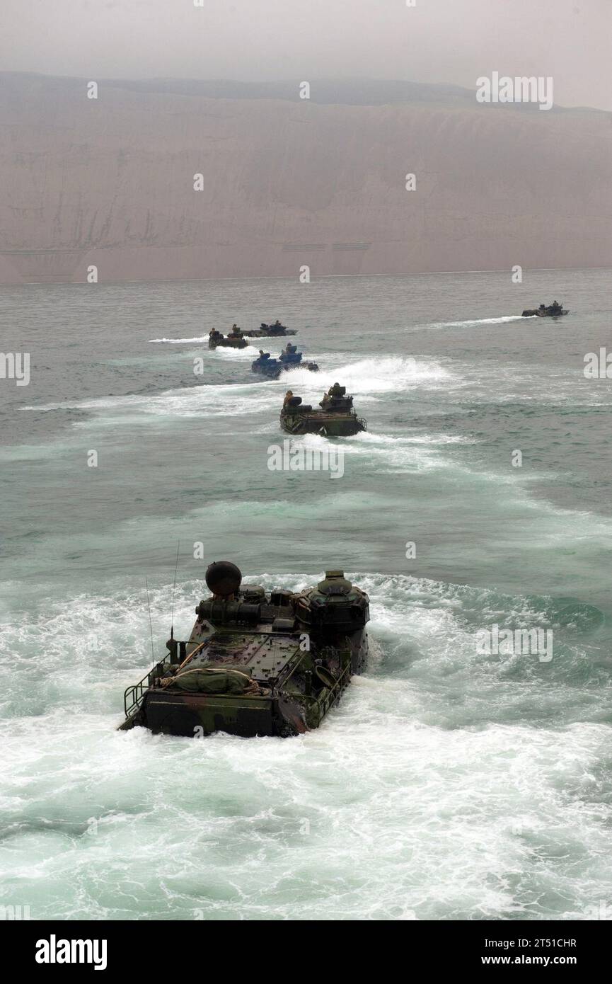 1007165319A-070 PACIFIC OCEAN (July 16, 2010) Marines assigned to Special Purpose Marine Air Ground Task Force (SPMAGTF) 24 transit to Salinas Beach, Peru in amphibious assault vehicles after disembarking the amphibious transport dock ship USS New Orleans (LPD 18). New Orleans is participating in Southern Partnership Station, an annual deployment of U.S. military training teams to the U.S. Southern Command area of responsibility in the Caribbean and Latin America. Navy Stock Photo