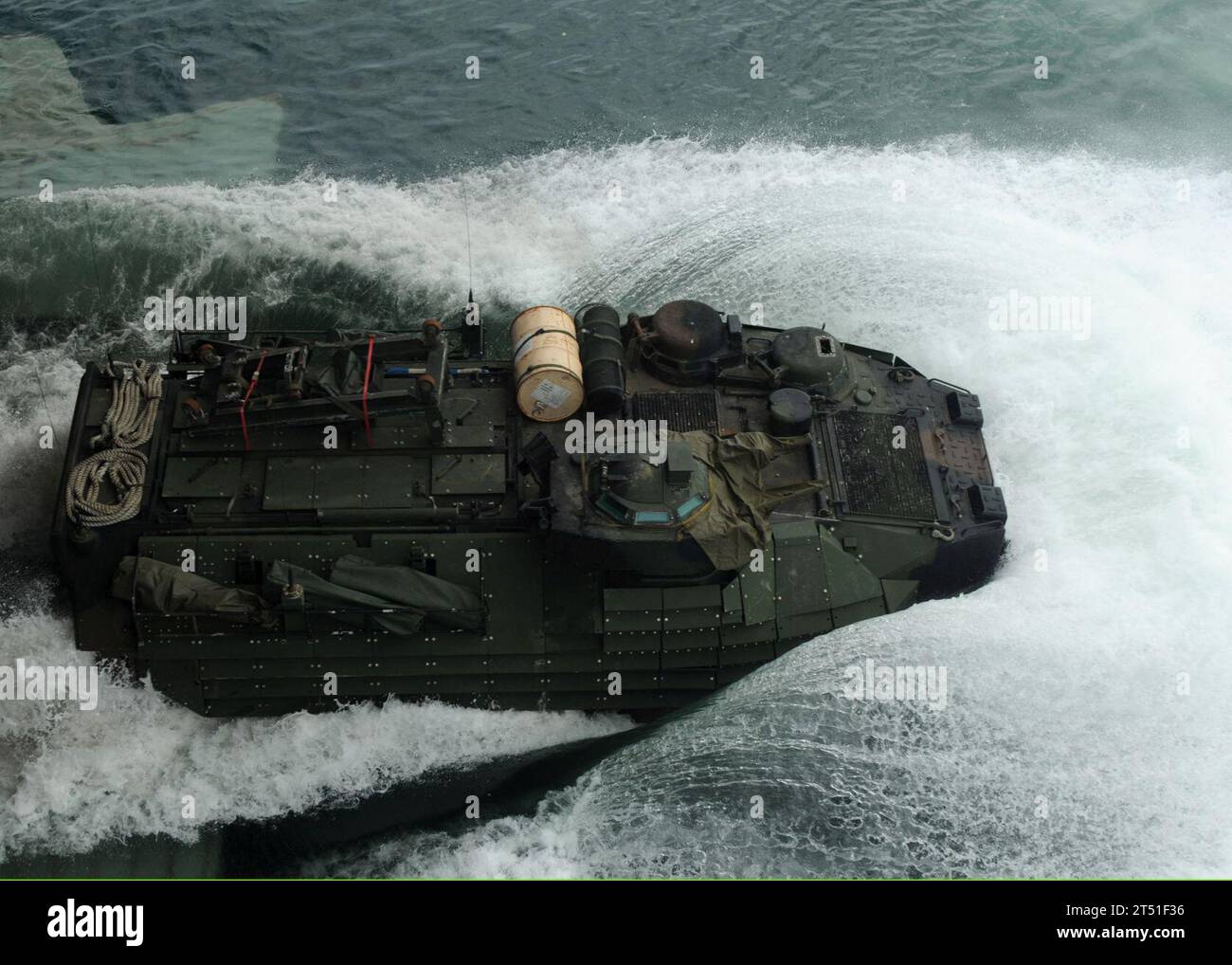 1010057680E-043 CHIRIQUI GRANDE, Panama (Oct. 5, 2010) An amphibious assault vehicle (AAV) assigned to Alpha Company of the 2nd Assault Amphibian Battalion leaves the well deck of the multi-purpose amphibious assault ship USS Iwo Jima (LHD 7). Service members aboard Iwo Jima took rides on the AAVs as an opportunity to experience an amphibious landing. Iwo Jima is supporting the Panama phase of the Continuing Promise 2010 humanitarian civic assistance mission. The assigned medical and engineering staff embarked aboard Iwo Jima are working with partner nations to provide medical, dental, veterin Stock Photo