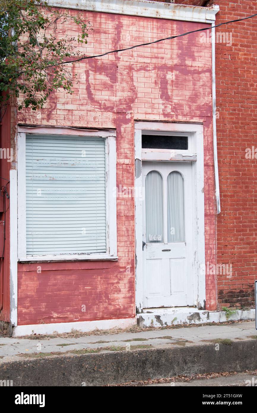 Old vintage downtown brick building front door Stock Photo