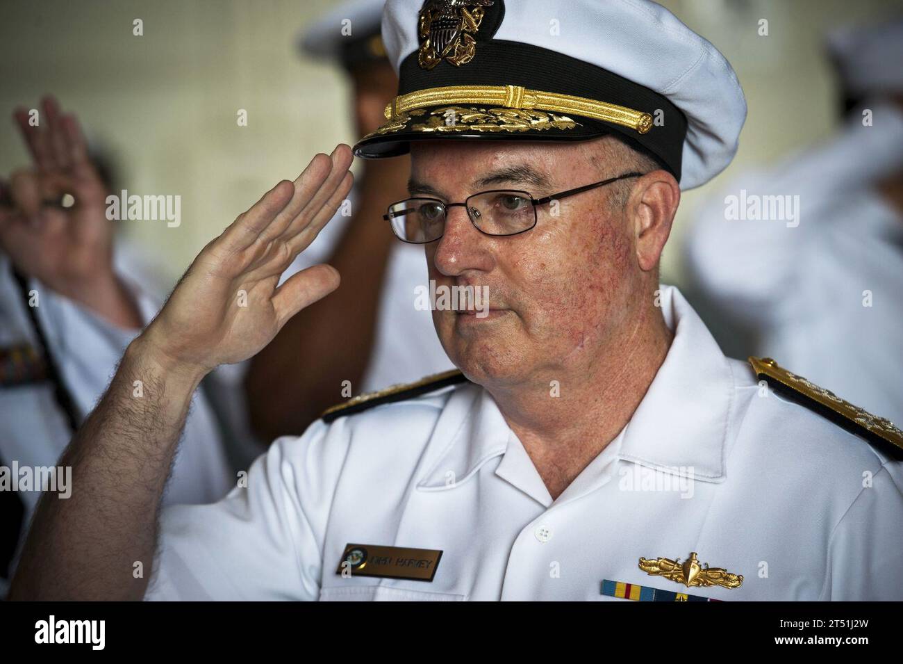 110622KK576-015 VIRGINIA BEACH, Va. (June 22, 2011) Adm. John C. Harvey Jr., commander of U.S. Fleet Forces Command, salutes as he is piped aboard during the Navy Cyber Forces change of command ceremony at Joint Expeditionary Base Little Creek-Fort Story. Rear Adm. Gretchen S. Herbert relieved Rear Adm. Thomas P. Meek as commander of Navy Cyber Forces, the Navy's global type commander responsible for generating current and future cyber readiness in the Fleet. Navy Stock Photo