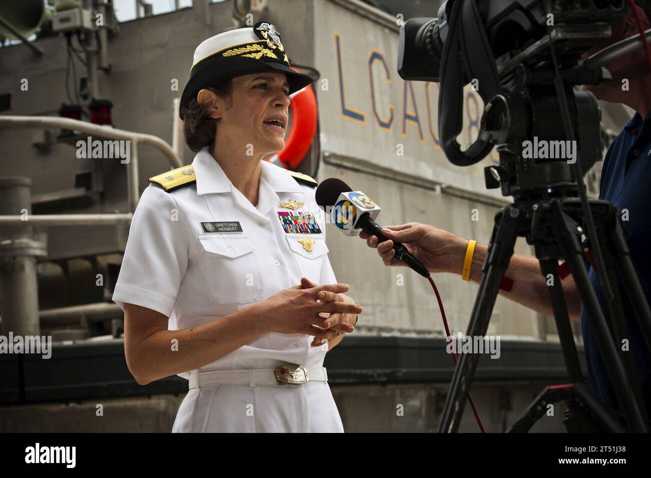 110622KK576-062 VIRGINIA BEACH, Va. (June 22, 2011) Rear Adm. Gretchen S. Herbert gives an interview to a news reporter after the Navy Cyber Forces change of command ceremony at Joint Expeditionary Base Little Creek-Fort Story. Rear Adm. Gretchen S. Herbert relieved Rear Adm. Thomas P. Meek as commander of Navy Cyber Forces, the Navy's global type commander responsible for generating current and future cyber readiness in the Fleet. Navy Stock Photo