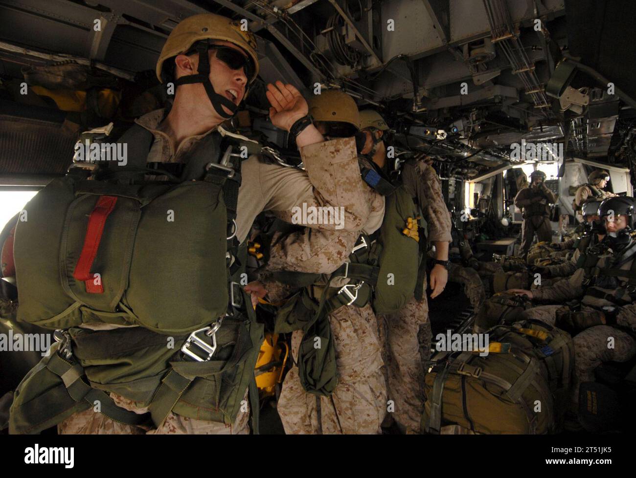 110625DB458-088 GULF OF ADEN (June 25, 2011) Marines assigned to the 13th Marine Expeditionary Unit (13th MEU) prepare to jump from an H-53 Sea Stallion helicopter assigned to the Evil Eyes of Marine Medium Helicopter Squadron (HMM) 163 during a routine parachute training evolution. The 13th MEU is embarked aboard the amphibious assault ship USS Boxer (LHD 4) and is underway supporting maritime security operations and theater security cooperation efforts in the U.S. 5th Fleet area of responsibility. Navy Stock Photo