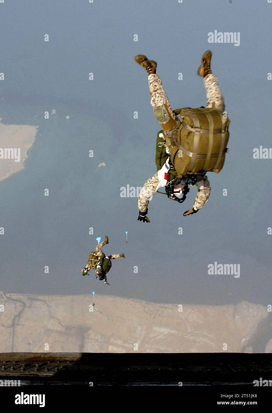 110625DB458-127 GULF OF ADEN (June 25, 2011) Marines assigned to the 13th Marine Expeditionary Unit (13th MEU) jump from an H-53 Sea Stallion helicopter assigned to the Evil Eyes of Marine Medium Helicopter Squadron (HMM) 163 during a routine sky diving evolution. The 13th MEU is embarked aboard the amphibious assault ship USS Boxer (LHD 4) and is underway supporting maritime security operations and theater security cooperation efforts in the U.S. 5th Fleet area of responsibility. Navy Stock Photo