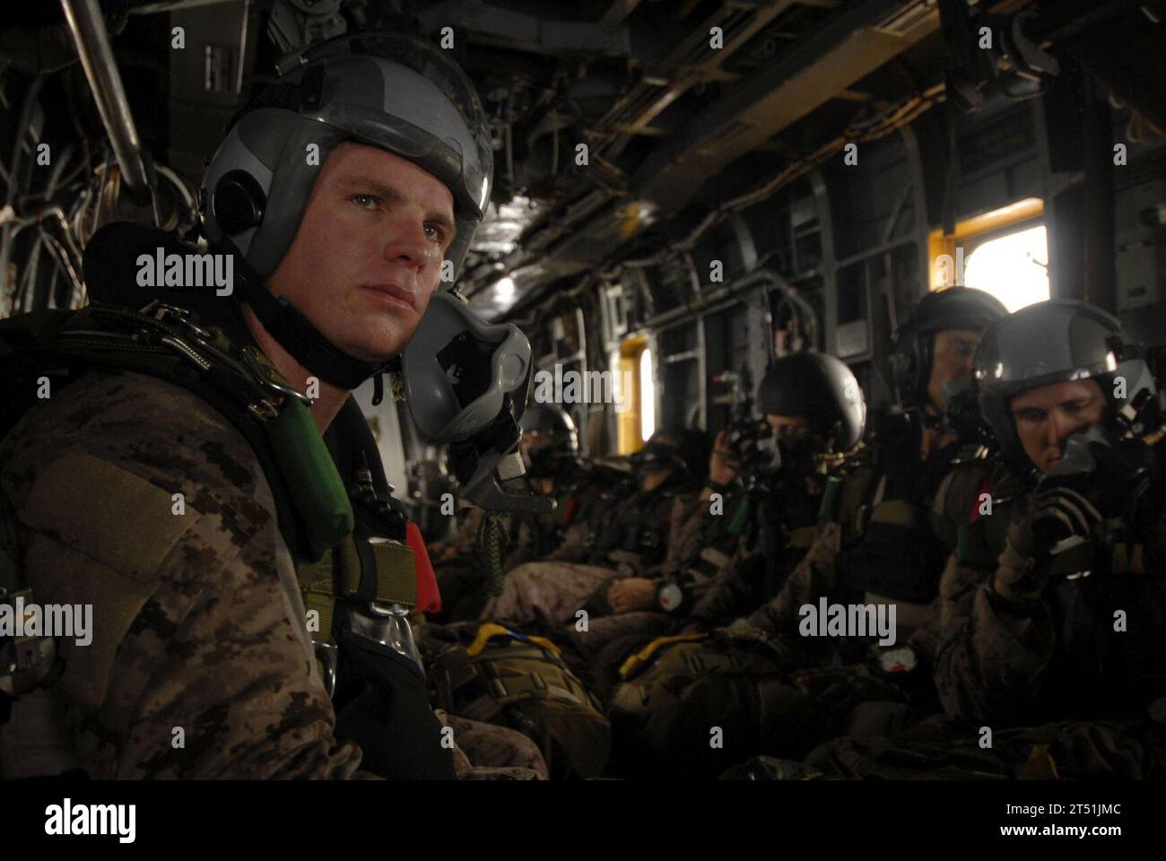 110625DB458-049 GULF OF ADEN (June 25, 2011) Marines assigned to the 13th Marine Expeditionary Unit (13th MEU) stand by as an H-53 Sea Stallion helicopter assigned to the Evil Eyes of Marine Medium Helicopter Squadron (HMM) 163 transports them to their drop point for a routine parachute training evolution. The 13th MEU is embarked aboard the amphibious assault ship USS Boxer (LHD 4) and is underway supporting maritime security operations and theater security cooperation efforts in the U.S. 5th Fleet area of responsibility. Navy Stock Photo