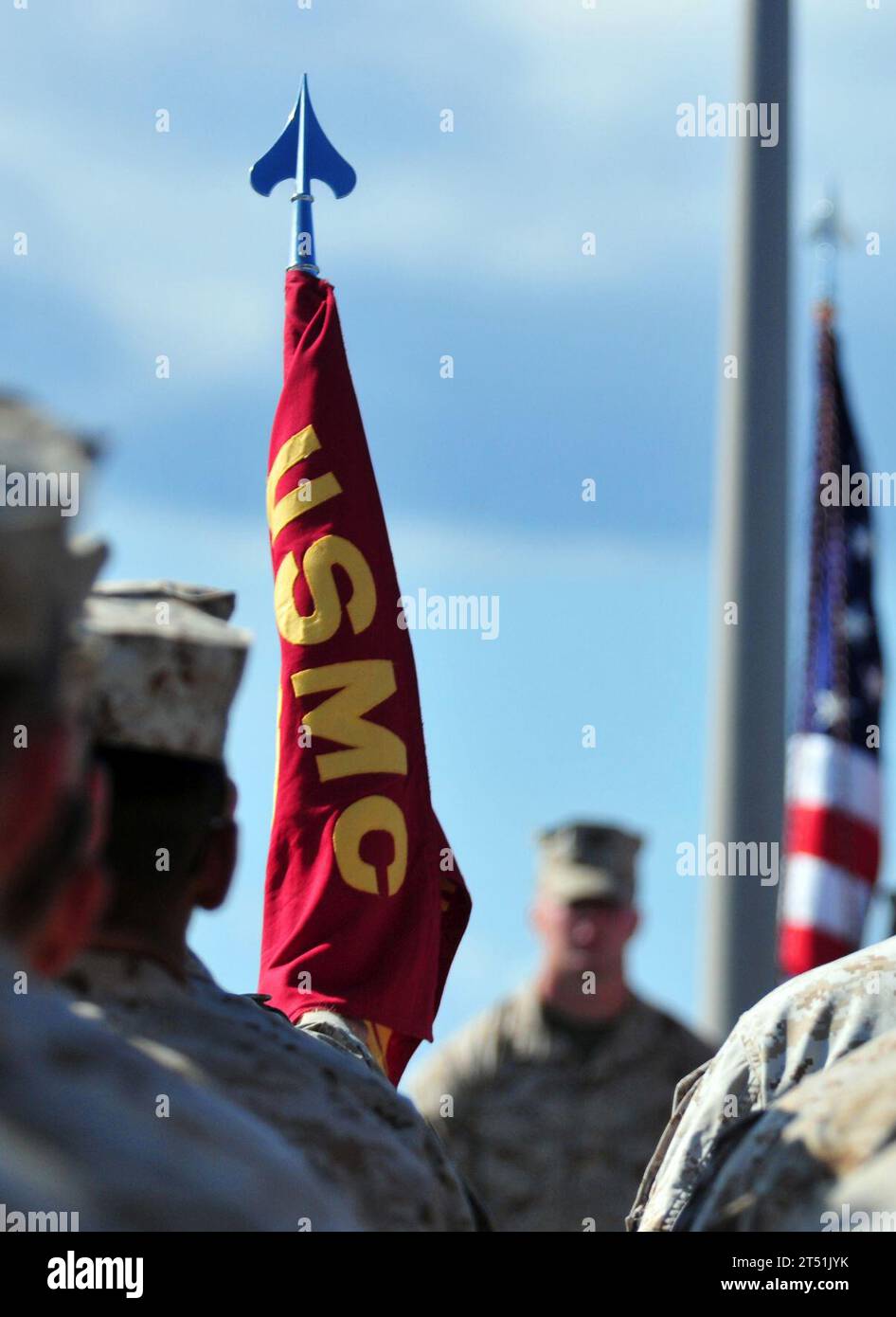 1011107948R-096  INDIAN OCEAN (Nov. 10, 2010) Marines from the 15th Marine Expeditionary Unit (15th MEU) assigned to Battalion Landing Team, 1st Battalion 4th Marines and Combat Logistics Battalion 15 stand at parade rest during a ceremony commemorating the 235th Marine Corps birthday aboard the amphibious dock landing ship USS Pearl Harbor (LSD 52). Pearl Harbor is part of the Peleliu Amphibious Ready group, which is transiting the U.S. 7th Fleet area of responsibility. Navy Stock Photo