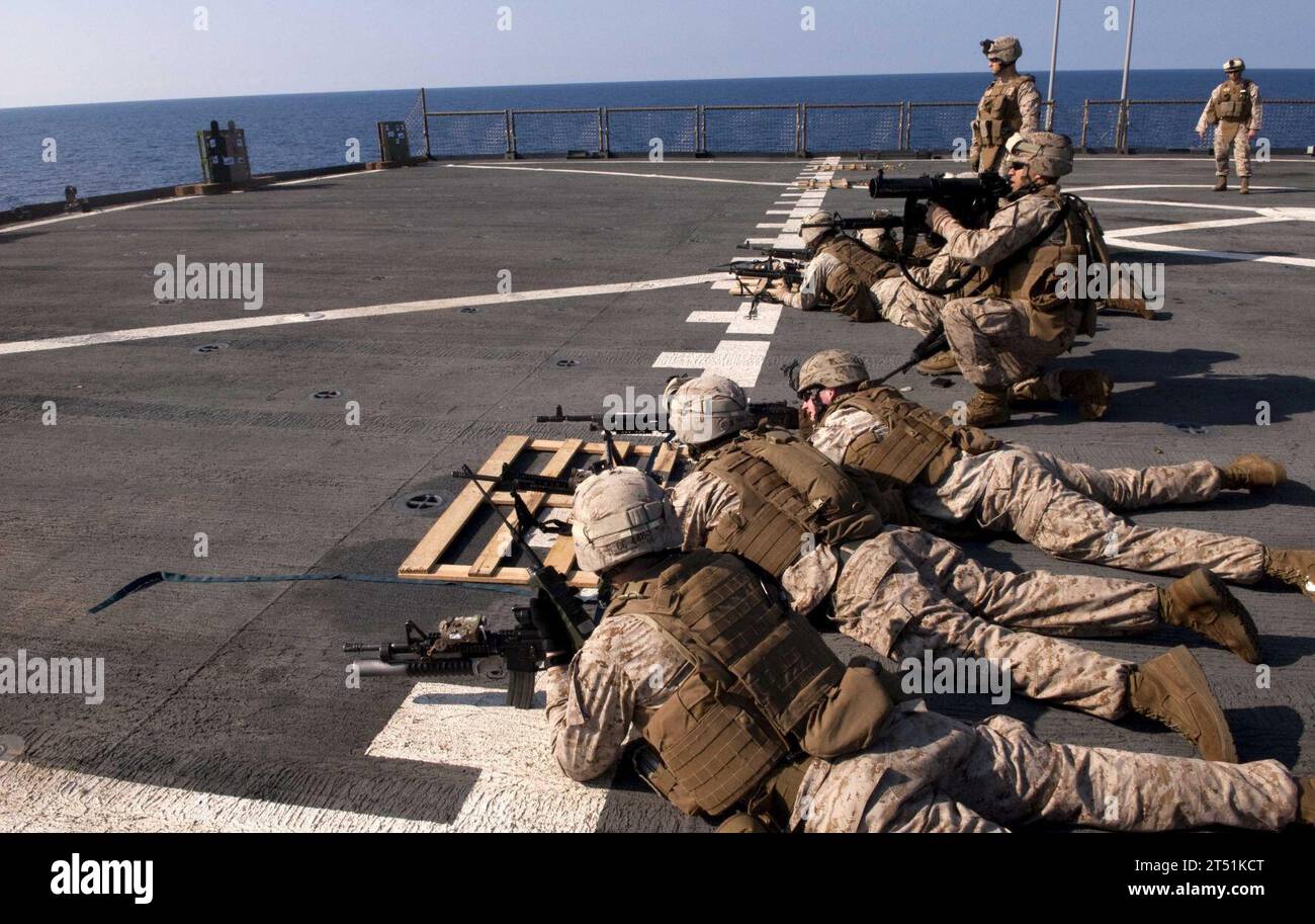 110510QP268-191 MEDITERRANEAN SEA (May 10, 2011) Marines assigned to the 22nd Marine Expeditionary Unit (22nd MEU) fire at targets during a platoon live-fire weapons training aboard the amphibious dock landing ship USS Whidbey Island (LSD 41). Whidbey Island is deployed as part of the Bataan Amphibious Ready Group supporting maritime security operations and theater security cooperation efforts in the U.S. 6th Fleet area of responsibility. Navy Stock Photo