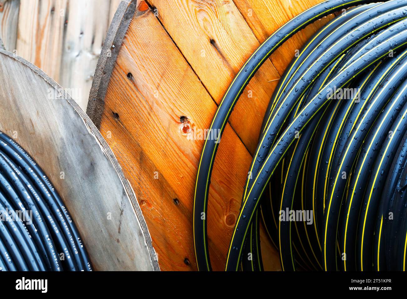 Digital fiber cable stored on drums before installation Stock Photo