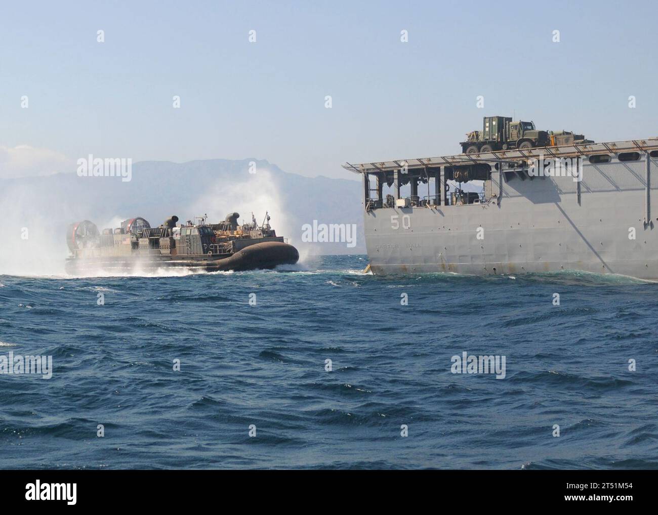 1011028069G-491 GULF OF ADEN (Nov. 2, 2010) A landing craft air cushion (LCAC) enters the well deck of the amphibious dock landing ship USS Carter Hall (LSD 50) after conducting amphibious training exercises in Djibouti. Carter Hall is part of Kearsarge Amphibious Ready Group and is supporting maritime security operations and theater security cooperation efforts in the U.S. 5th Fleet area of responsibility. Navy Stock Photo