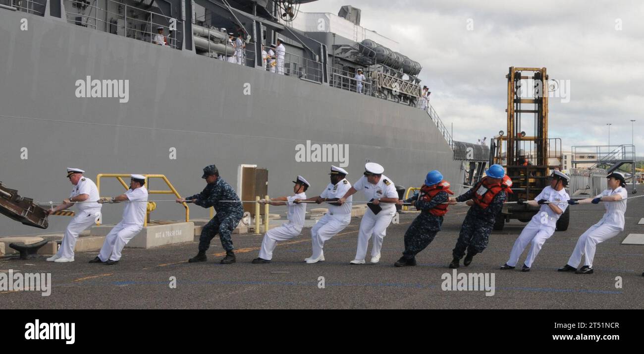 1006080464S-017 PEARL HARBOR (June 8, 2010) Sailors from the U.S. Navy and the Japan Maritime Self-Defense Force pull the brow on the pier as the Japan Maritime Self-Defense Force training squadron ship JS Kashima (TV 3508) arrives at Joint Base Pearl Harbor-Hickam for a port visit. This year marks the 50th anniversary of the U.S. and Japan Treaty of Mutual Cooperation of Security that in 1960 established the alliance between the two countries. (U.S. Navy Stock Photo