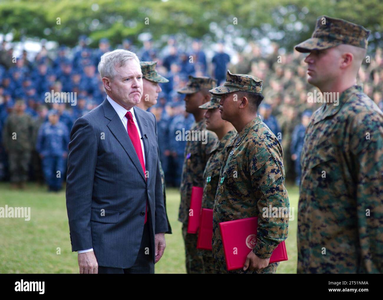 111206AC887-001  KANEOHE BAY, Hawaii (Dec. 6, 2011) Secretary of the Navy (SECNAV) the Honorable Ray Mabus participates in an award ceremony during a recent visit to Marine Corps Base, Kaneohe Bay. Mabus awarded the Purple Heart, two Navy and Marine Corps Commendation medals with combat distinction, and meritoriously promoted a Marine to Corporal. Navy Stock Photo