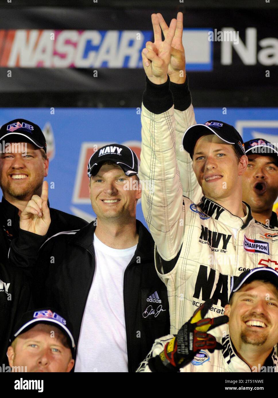 0808225345W-259 BRISTOL, Tenn. (Aug. 22, 2008) JR Motorsports co-owner Dale Earnhardt, Jr., center, celebrates with driver Brad Keselowski, right, and the rest of the No. 88 U.S. Navy Chevrolet Monte Carlo team in victory lane after winning the NASCAR Nationwide Series Food City 250 at Bristol Motor Speedway in Bristol. Keselowski overcame a 37th place starting position to claim his second career victory and won second place overall in the nationwide championship standings. Navy Stock Photo