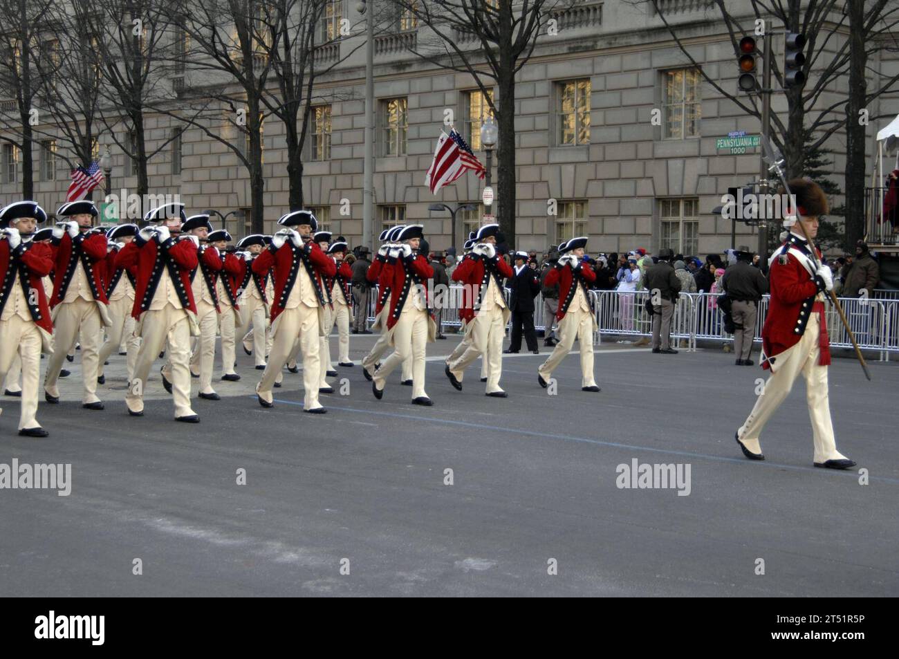0901209954T-132 WASHINGTON (Jan. 20, 2009) The Army Old Guard Fife and Drum Corps march down Pennsylvania Avenue during the 2009 presidential inaugural parade in Washington, D.C., Jan. 20, 2009. More than 5,000 men and women in uniform are providing military ceremonial support to the 2009 Presidential Inauguration, a tradition dating back to George Washington's 1789 Inauguration. Navy Stock Photo