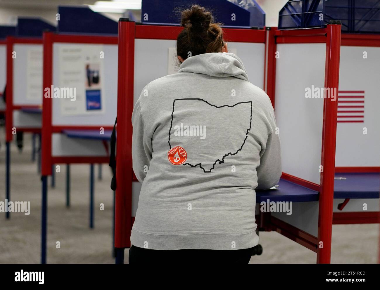 A person with an outline of the state of ohio on the back of their