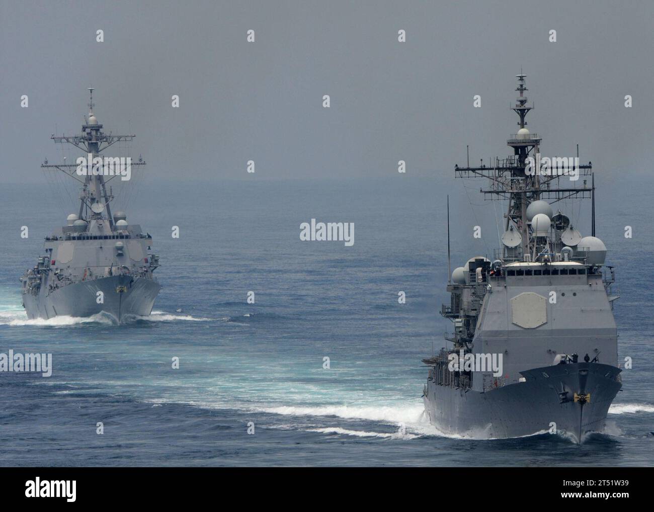 1008045016P-003 PACIFIC OCEAN (Aug. 4, 2010) The guided-missile cruiser USS Cape St. George (CG 71) and the guided-missile destroyer USS Sterett (DDG 104) are underway during a composite training unit exercise. Cape St. George and Sterett are part of the Abraham Lincoln Carrier Strike Group. Navy Stock Photo