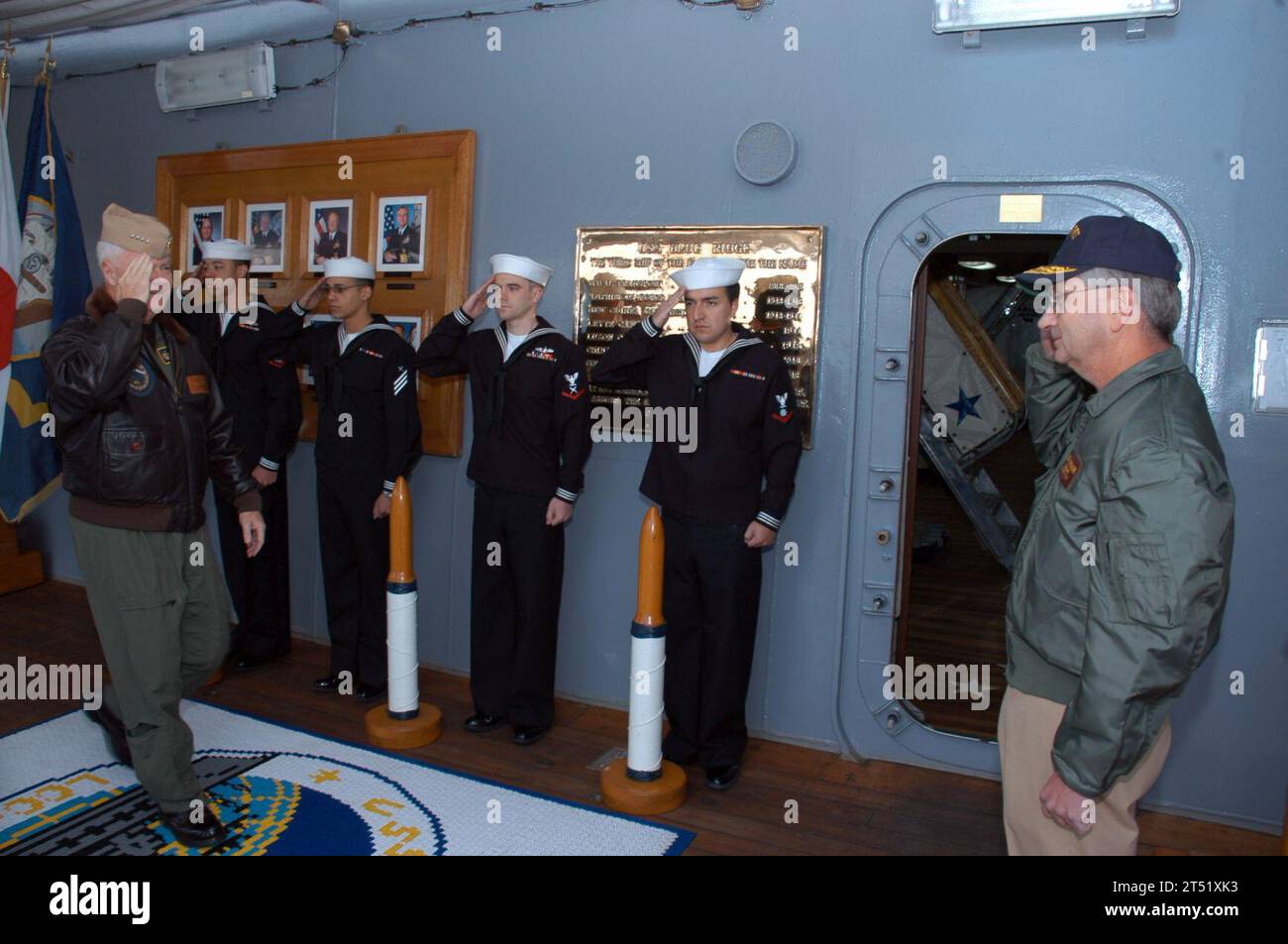 0711082746V-003 YOKOSUKA, Japan (Nov. 8, 2007) - Adm. Timothy Keating, commander of U.S. Pacific Command, walks through the sideboys to meet Vice Adm. Doug Crowder, commander of U.S. 7th Fleet, aboard the 7th Fleet flagship, USS Blue Ridge (LCC 19). Keating was in Yokosuka during a brief tour of assets in the Pacific. U.S. Navy Stock Photo