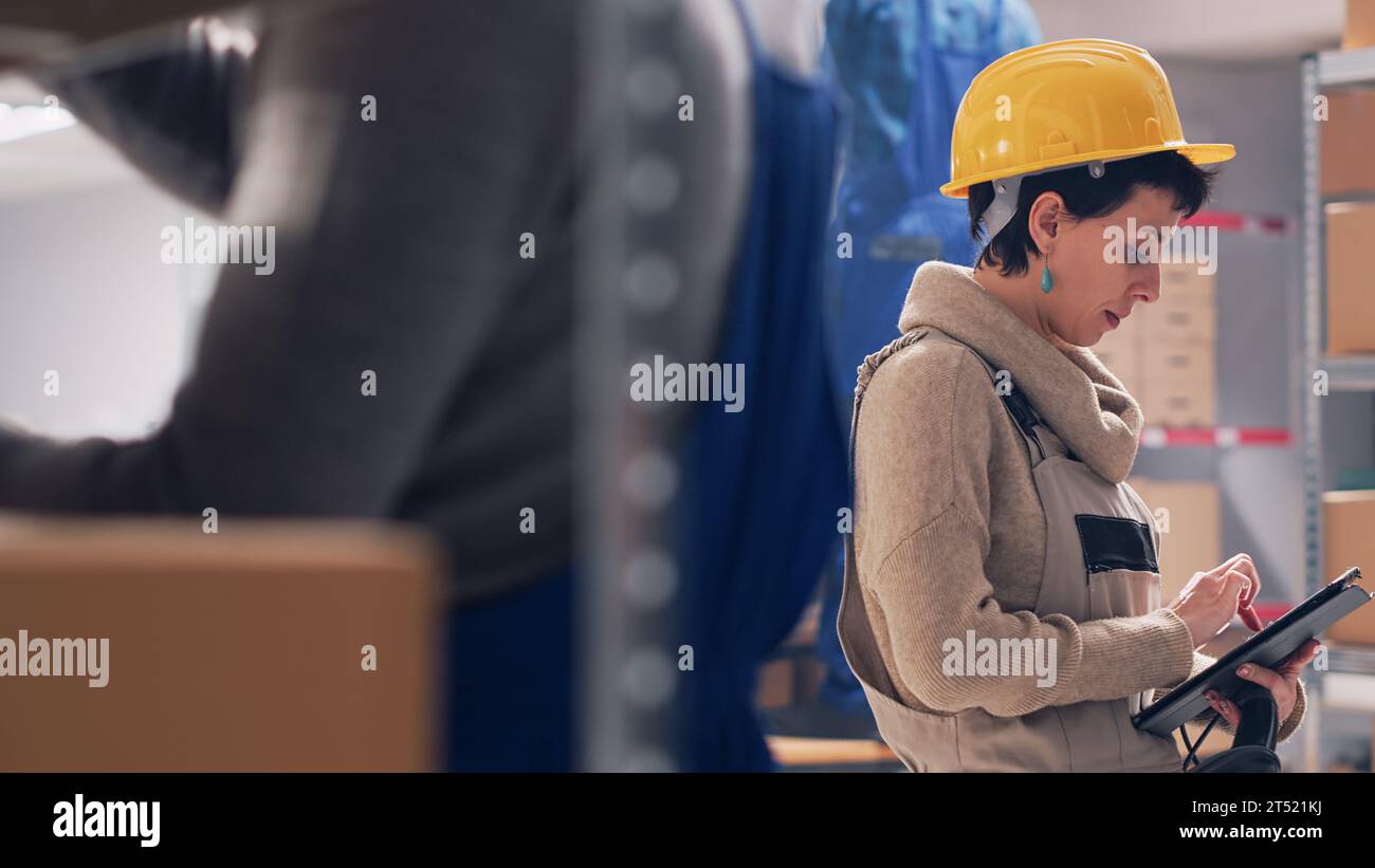 Delivery service workers scanning barcodes hi-res stock photography and ...