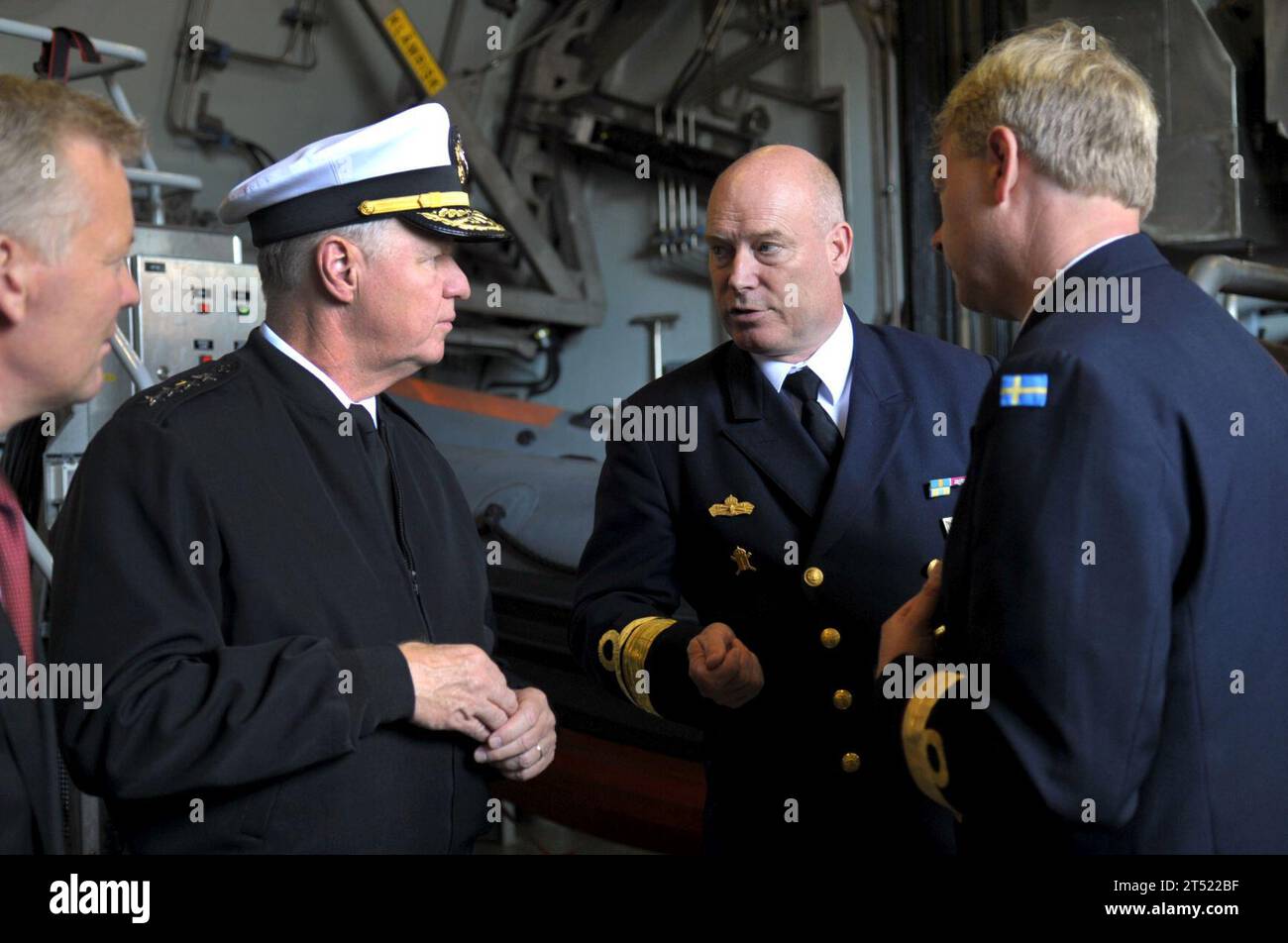 1008198273J-066 KARLSKRONA, Sweden (Aug. 19, 2010) Chief of Naval Operations (CNO) Adm. Gary Roughead, left, speaks with Rear Adm.  Anders Grenstad, Chief of Staff of the Royal Swedish Navy while aboard the Swedish Navy Visby Corvette HSwMS NYKOPING at Naval Base Karlskrona Naval Base.  Navy Stock Photo