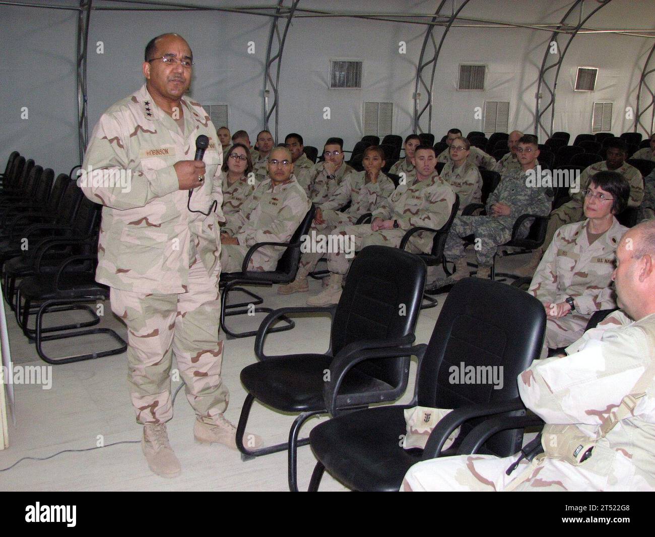 0712045422G-003   CAMP BUEHRING, Kuwait (Dec. 4, 2007)  Navy Surgeon General Vice Adm. Adam M. Robinson Jr. answers questions during an admiralХs call for medical personnel forward deployed to Kuwait. U.S. Navy Stock Photo