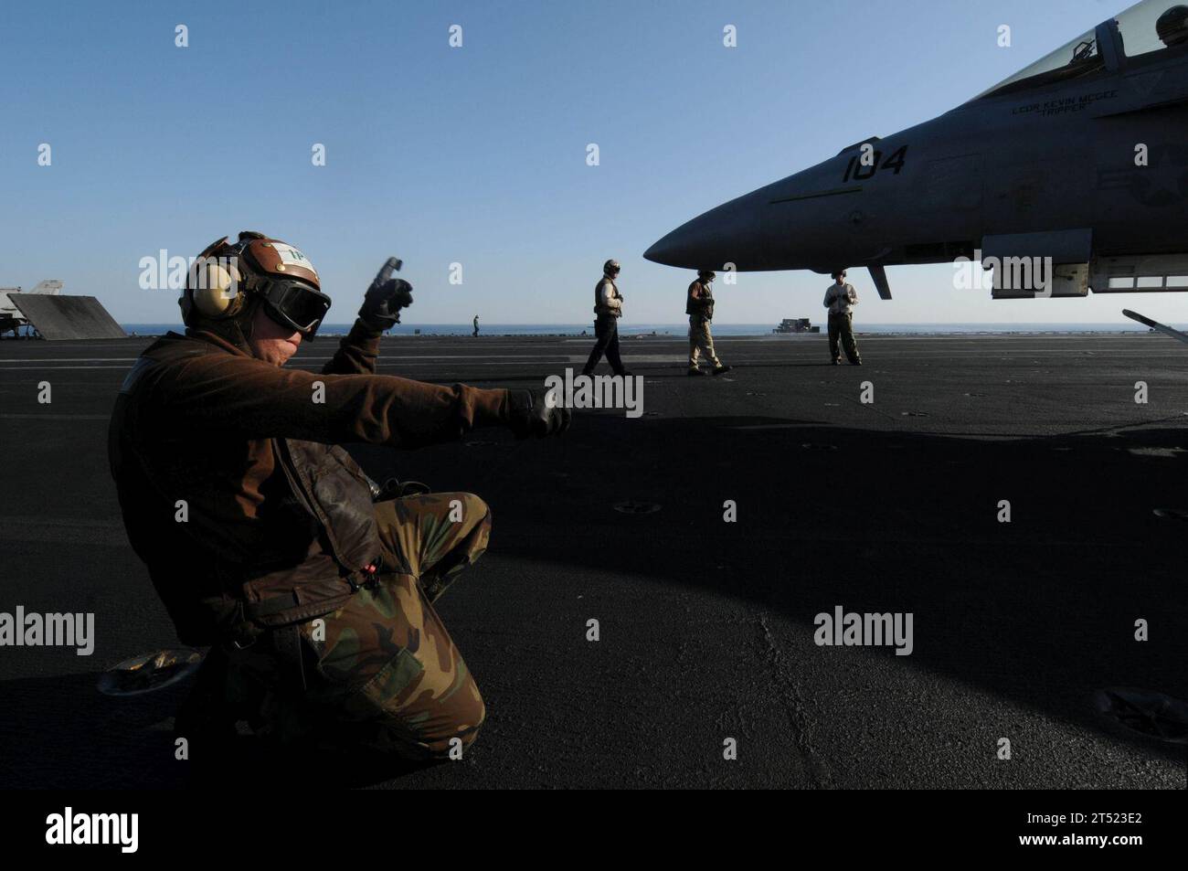 0912073038W-094 NORTH ARABIAN SEA (Dec. 7, 2009) Aircrew Survival Equipment Airman Joshua Matthews, assigned to the Black Aces of Strike Fighter Squadron (VFA) 41, initiates starting procedures for an F/A-18F Super Hornet aboard the aircraft carrier USS Nimitz (CVN 68). The Nimitz Carrier Strike Group is deployed to the U.S. 5th Fleet area of responsibility. Navy Stock Photo