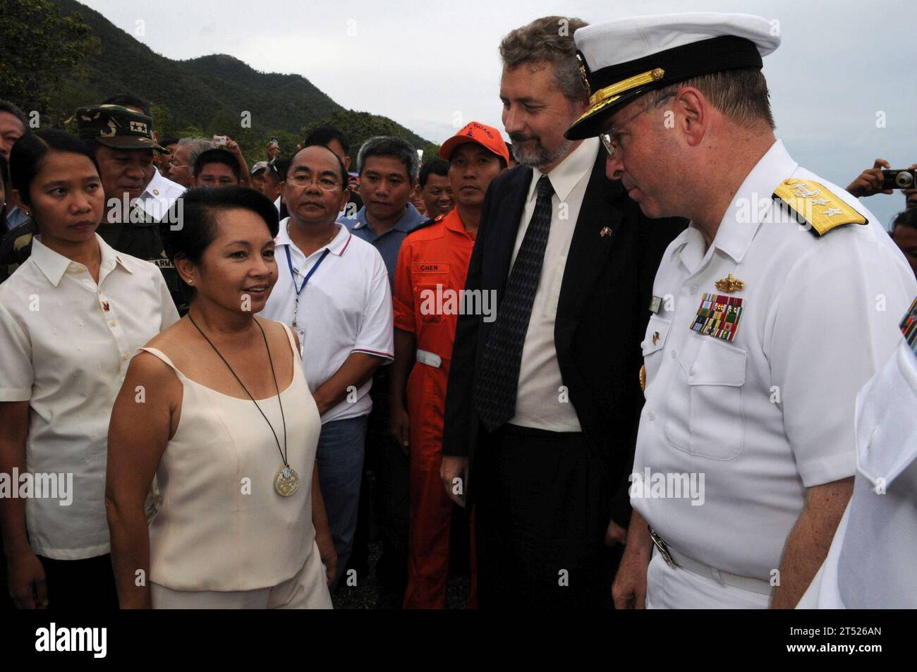 0807013659B-373 CEBU, Philippines (July 1, 2008) Rear Adm. James P. Wisecup, commander of the Ronald Reagan Carrier Strike Group, speaks with Philippines President Gloria Macapagal-Arroyo. Arroyo thanked Wisecup for the support the U.S. Navy is giving the Philippines during relief efforts in the wake of Typhoon Fengshen. The Ronald Reagan Carrier Strike Group is off the coast of Panay Island providing humanitarian assistance and disaster response to the region. U.S. Navy Stock Photo