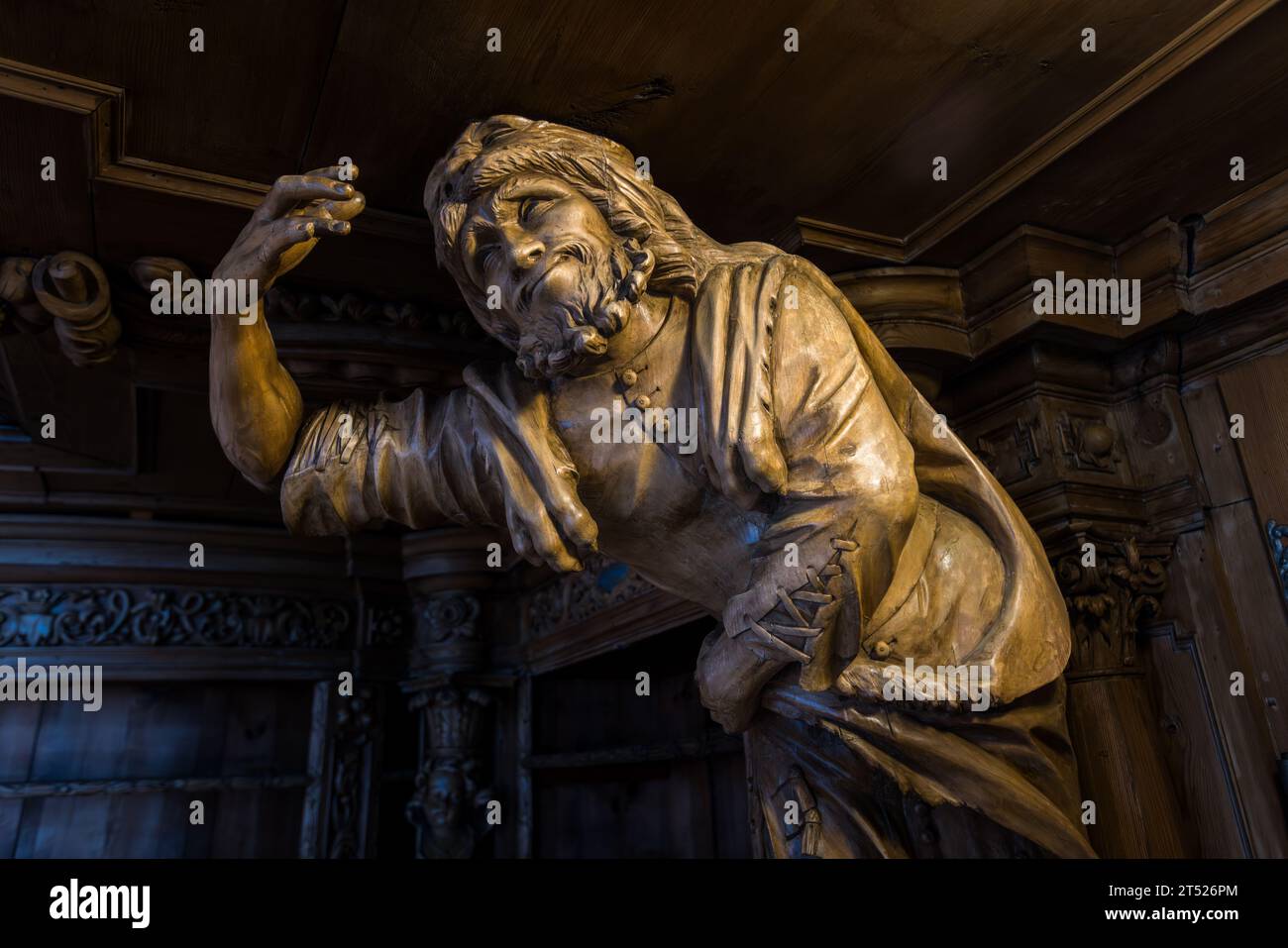 Figure of Pride by Karl Stilp from around 1725, the man is wearing a lion's skin. He wears the lion's head like a helmet, the paws dangle in front of his robe. Waldsassen, Germany Stock Photo