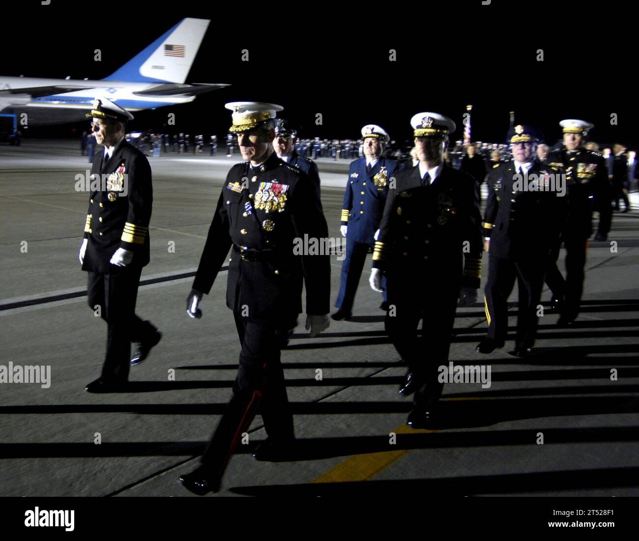 0612300193C-008 Washington, D.C. (Dec. 30, 2006) Р The Chairman of the Joint Chiefs of Staff, Gen. Peter Pace, and the Joint Chiefs of Staff walk to their vehicles to continue the ceremony for former U.S. President Gerald Ford at Andrews Air Force Base, Md., Dec. 30, 2006. Ford died at his home in Rancho Mirage, California, Dec. 26 at the age of 93.  A private interment service is scheduled for Jan. 3 at the Gerald R. Ford Presidential museum in Grand Rapids, Mich. Dept. of Defense Stock Photo