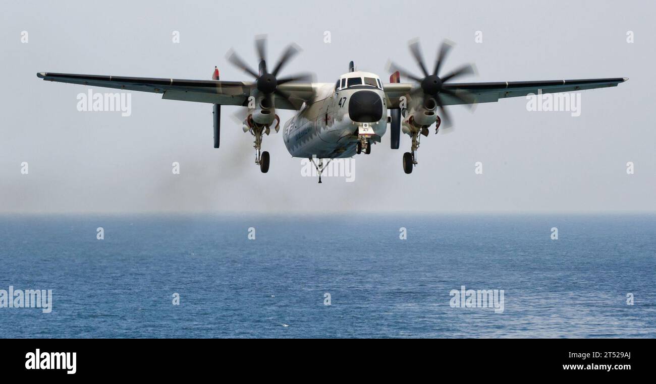 110221DR144-271  ARABIAN SEA (Feb. 21, 2011) A C-2A Greyhound assigned to Fleet Logistics Support Squadron (VRC) 40 lands aboard the Nimitz-class aircraft carrier USS Carl Vinson (CVN 70). The Carl Vinson Carrier Strike Group is deployed supporting maritime security operations and theater security cooperation efforts in the U.S. 5th Fleet area of responsibility. Navy Stock Photo