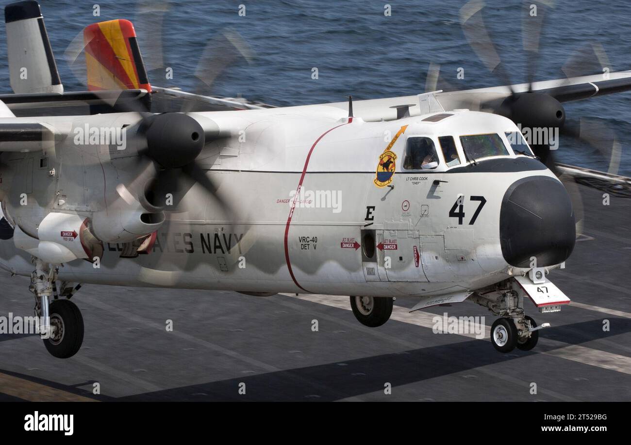 110221DR144-281  ARABIAN SEA (Feb. 21, 2011) A C-2A Greyhound assigned to Fleet Logistics Support Squadron (VRC) 40 lands aboard the Nimitz-class aircraft carrier USS Carl Vinson (CVN 70). The Carl Vinson Carrier Strike Group is deployed supporting maritime security operations and theater security cooperation efforts in the U.S. 5th Fleet area of responsibility. Navy Stock Photo