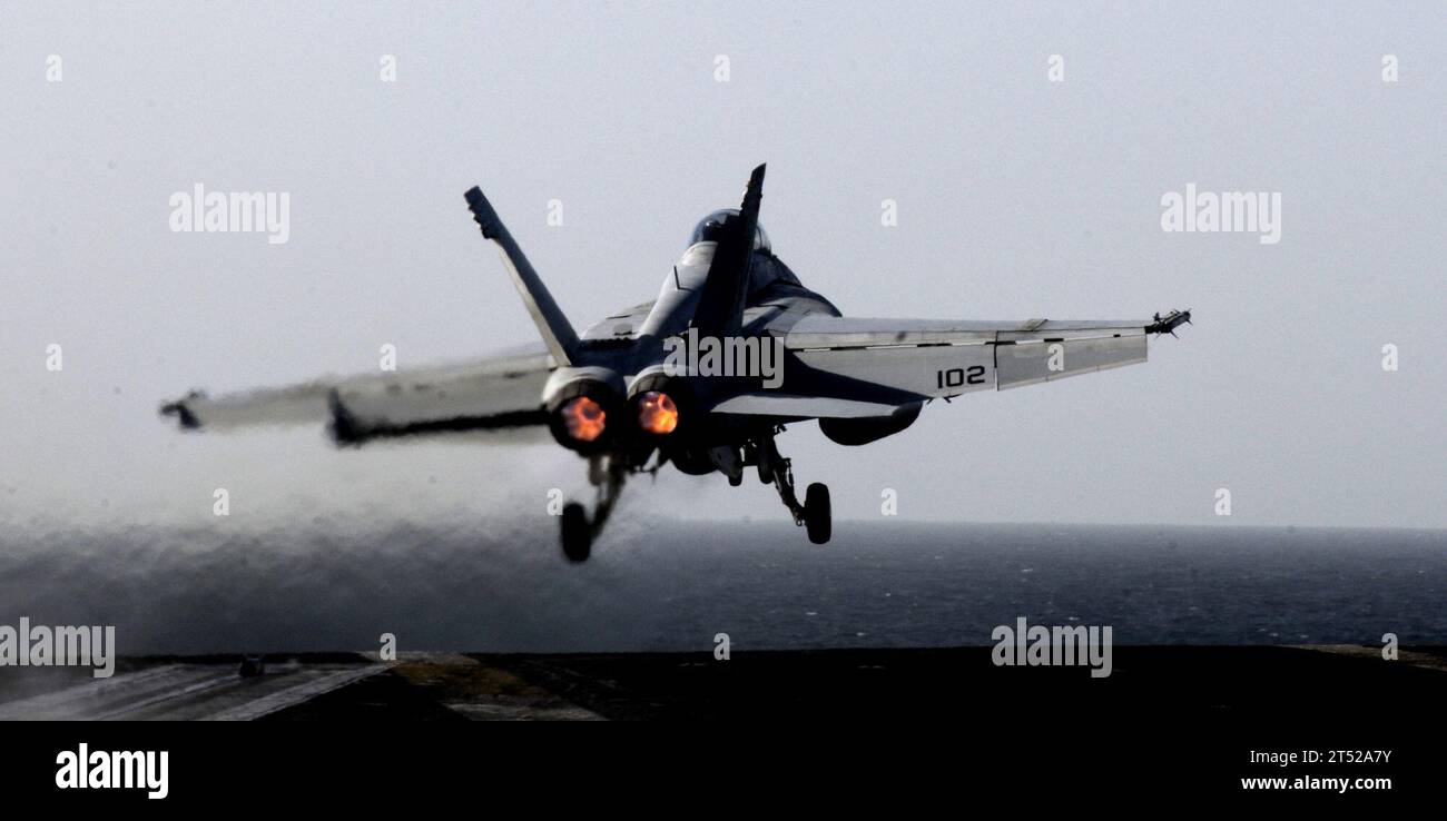 1103086320L-216 ARABIAN SEA (March 8, 2011) An F/A-18F Super Hornet assigned to Strike Fighter Squadron (VFA) 22 launches from the Nimitz-class aircraft carrier USS Carl Vinson (CVN 70). The Carl Vinson Carrier Strike Group is deployed supporting maritime security operations and theater security cooperation efforts in the U.S. 5th Fleet area of responsibility. Navy Stock Photo