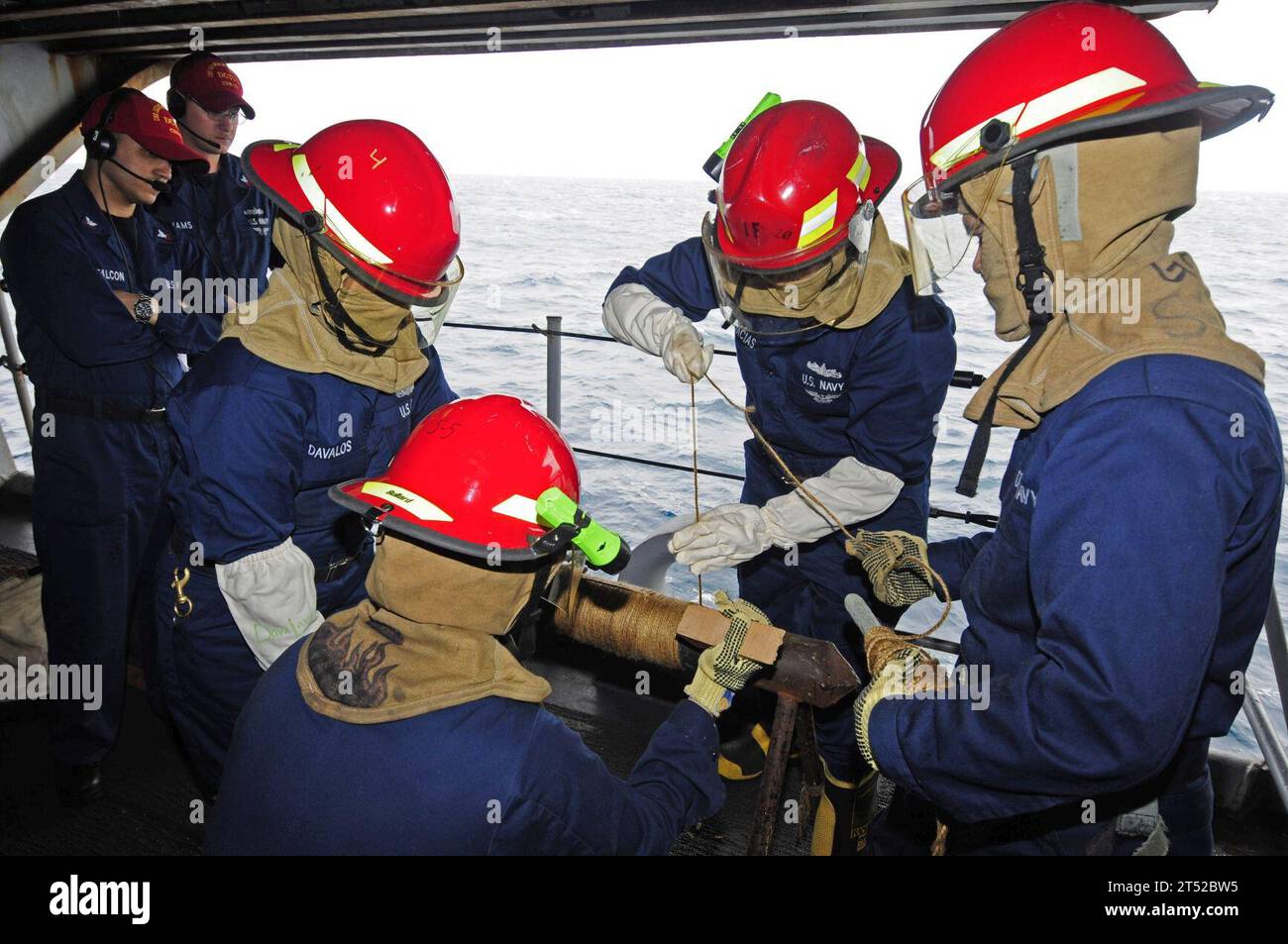 110712JO245-054 INDIAN OCEAN (July 12, 2011) Damage controlmen assigned ...