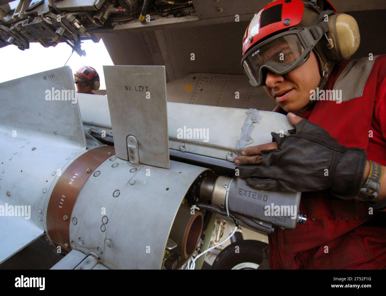 0802062948R-064 PERSIAN GULF (Feb. 6, 2008) An aviation ordinanceman works on the launch mechanism of an AGM-65 Maverick air-to-surface missile aboard the Nimitz-class aircraft carrier USS Harry S. Truman (CVN 75). Truman and embarked Carrier Air Wing (CVW) 3 are on deployment supporting Operations Iraqi Freedom, Enduring Freedom and maritime security operations. U.S. Navy Stock Photo