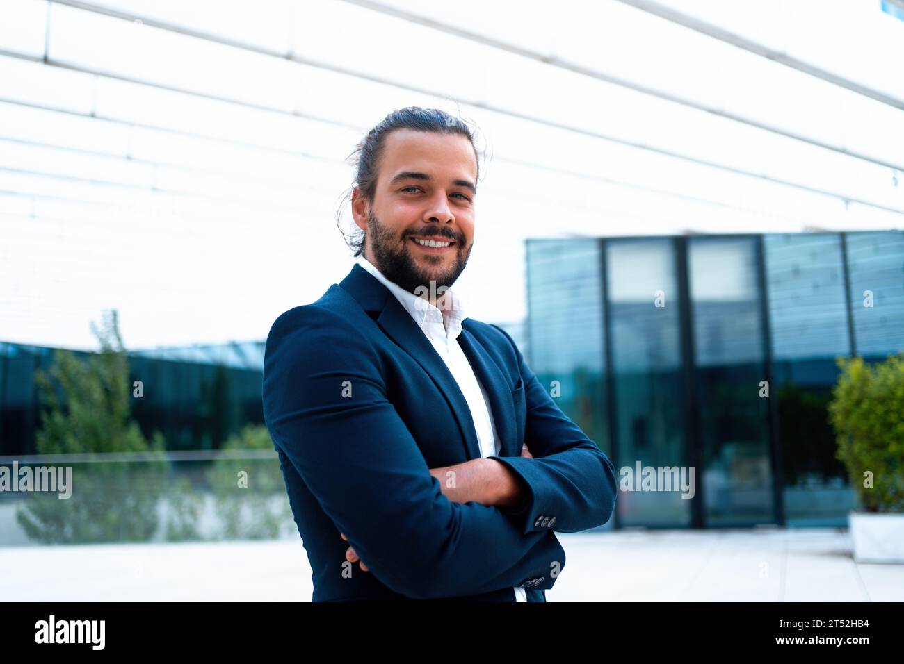 Successful businessman suit with beard standing in front of office ...