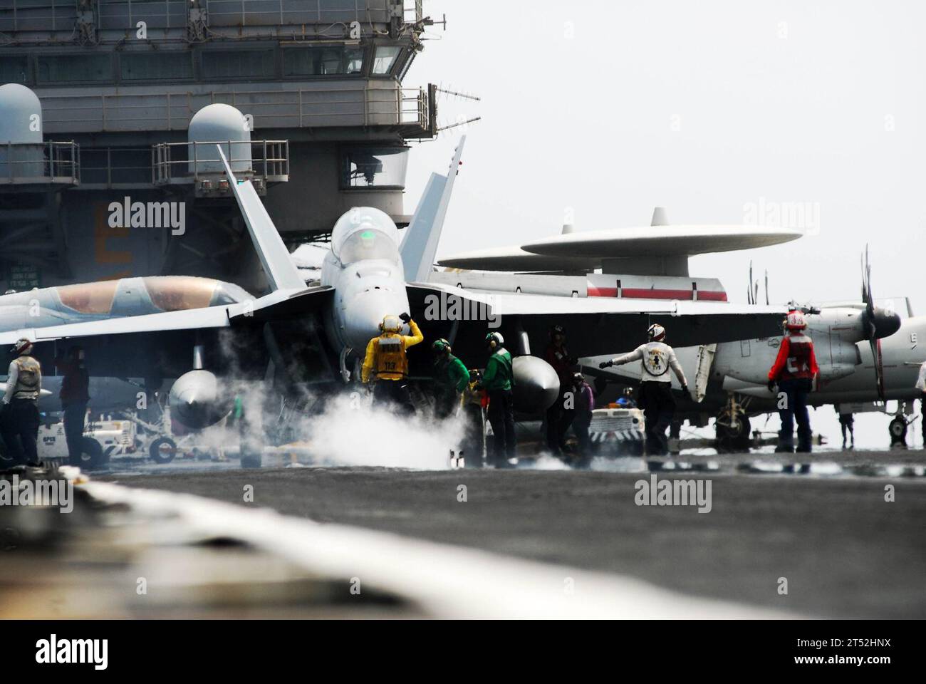 110627GL340-053 ARABIAN SEA (June 27, 2011) An F/A-18F Super Hornet assigned to the Black Knights of Strike Fighter Squadron (VFA) 154 prepares to launch from the aircraft carrier USS Ronald Reagan (CVN 76). Ronald Reagan and Carrier Air Wing (CVW) 14 are deployed to the U.S. 5th Fleet area of responsibility, conducting close-air support missions as part of Operation Enduring Freedom. Navy Stock Photo