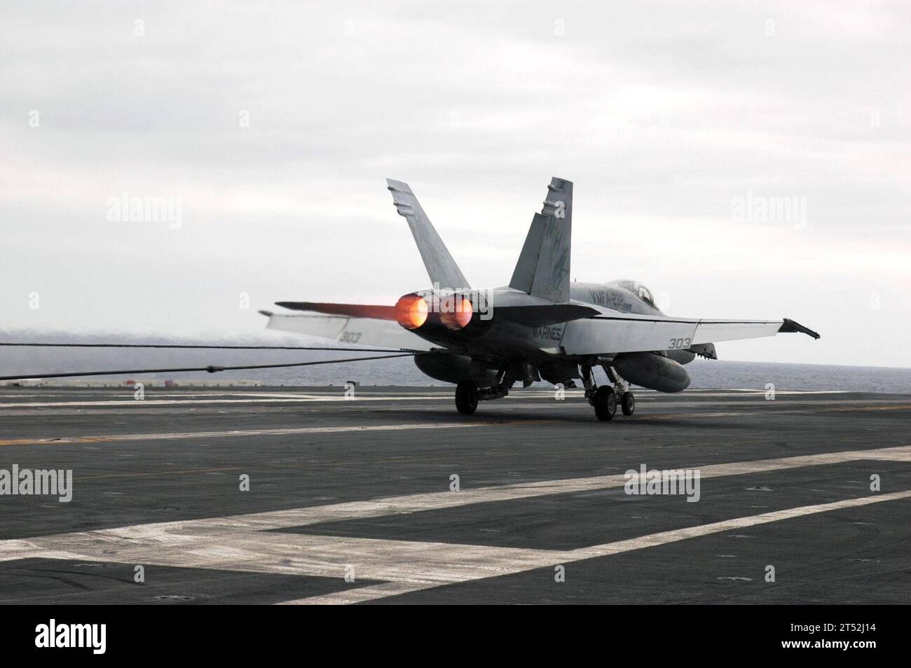 0610308119R-349 Pacific Ocean (Oct. 30, 2006) Р An F/A-18 Hornet assigned to the ТRed DevilsУ of Marine Fighter Attack Squadron Two Three Two (VMFA-232) lands safely aboard the nuclear-powered aircraft carrier USS Nimitz (CVN 68). Nimitz is currently underway conducting Tailored Ships Training Availability (TSTA) off the coast of Southern California. U.S. Navy Stock Photo