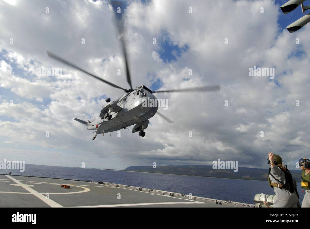 0807139671T-126 PACIFIC OCEAN (July 13, 2008) An RAN SH-3 Sea King takes off from the flight deck of Her Majesty's Australian amphibious ship HMAS Tobruk (LSH 50) during Exercise Rim of the Pacific (RIMPAC) 2008. RIMPAC is the worldХs largest multinational exercise and is scheduled biennially by the U.S. Pacific Fleet. Participants include the U.S., Australia, Canada, Chile, Japan, Netherlands, Peru, Republic of Korea, Singapore and the United Kingdom. Navy Stock Photo