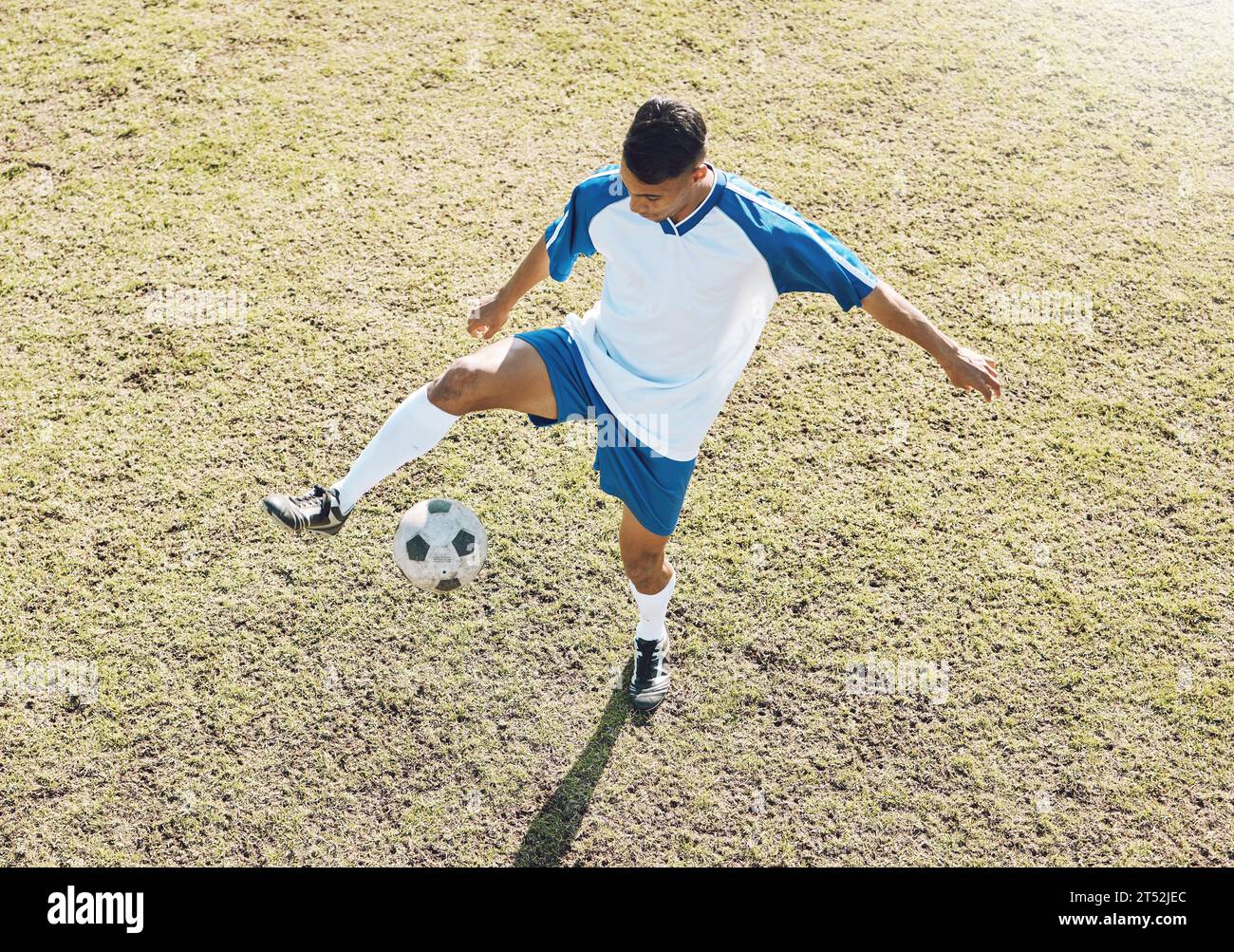 Running Kick Football, soccer ball and athlete doing sports cardio, training and ...