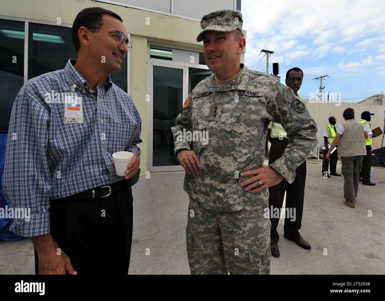 1002195961C-008 PORT-AU-PRINCE, Haiti (Feb. 19, 2010)  Art Torno, left, American Airlines Regional Director for the Caribbean,  speaks with Gen. Ken Keene, commanding general of Operation Unified Response, at Toussaint Louverture International Airport in Port-au-Prince, Haiti.  American Airlines is the first commercial airline to resume flights into Haiti since a 7.0 magnitude earthquake caused severe damage in and around Port-au-Prince Jan. 12.  Navy Stock Photo