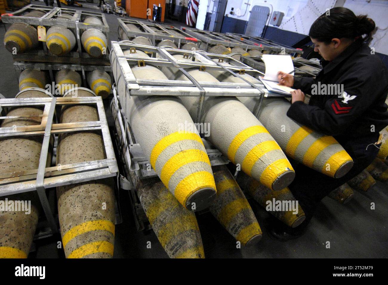 ammunition cross-deck, atlantic ocean, general purpose bombs, Nimitz-class aircraft carrier USS Harry S. Truman (CVN 75), uss theodore roosevelt, weapons magazine Stock Photo